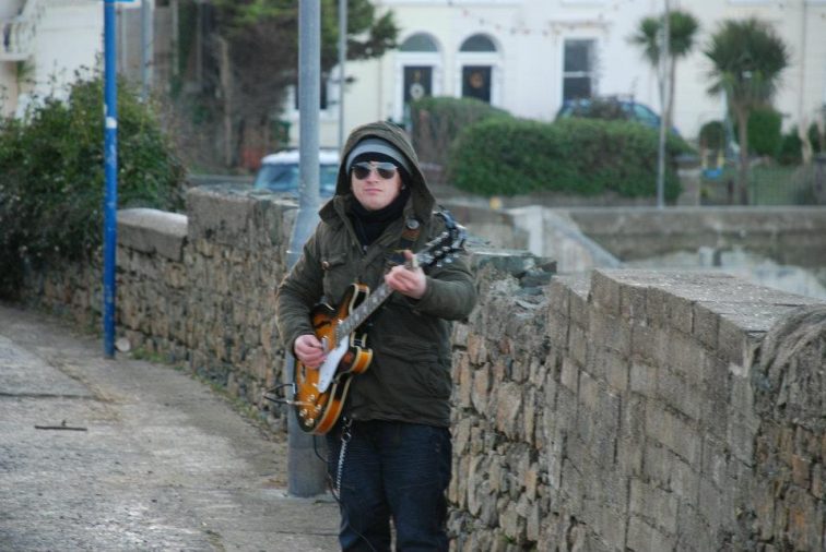 Jimi-Busking-in-the-Cold